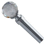 A silver metal object with a large crystal on top. AI generated content