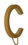 A gold C-shaped piece of jewelry. AI generated content